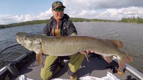 Angler holding large fish
