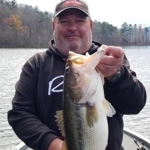 Lonnie Cochran holding fish