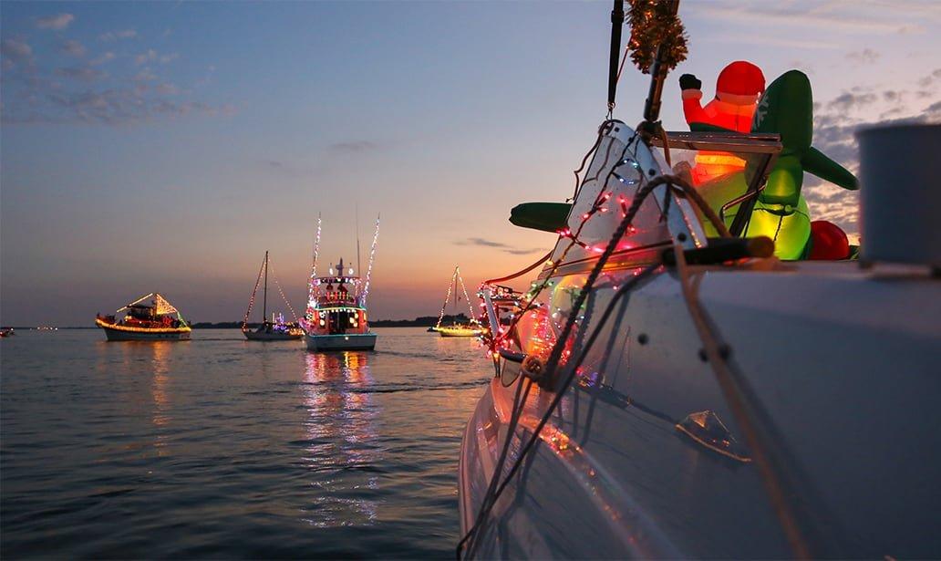 Boats in water decorated for holidays